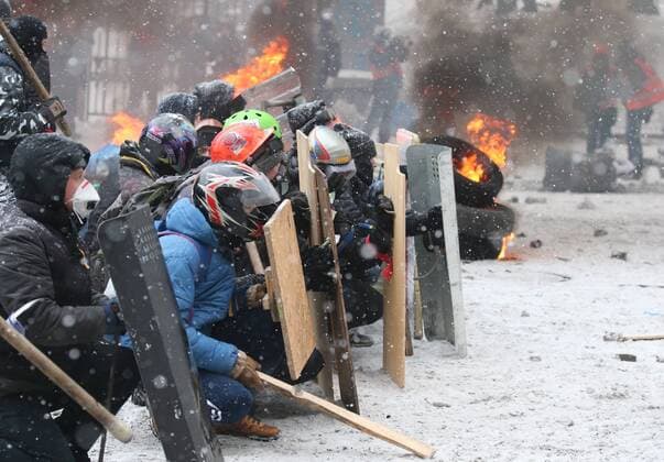 ITAR-TASS: KIEV, UKRAINE. JANUARY 22, 2014. Ukraine s opposition supporters in Kyiv s center. On 16 January 2014 Ukraine s parliament, Verkhovna Rada, adopted tougher security laws, which sparked a new wave of violence in the capital.  premiumd Aufmacher RE136950
