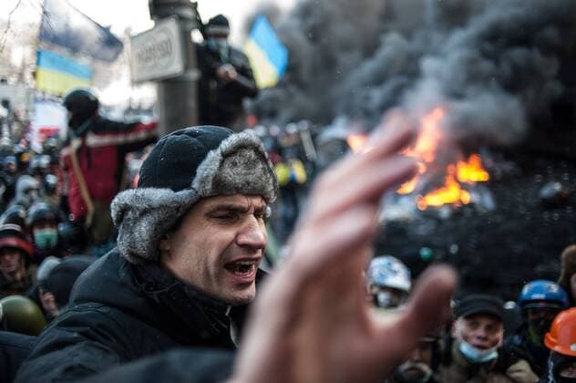ITAR-TASS: KIEV, UKRAINE. JANUARY 23, 2014. Udar party leader Vitali Klitschko speaks to opposition demonstrators who rally in Kiev s Grushevsky Street. On 16 January 2014 Ukraine s parliament, Verkhovna Rada, adopted tougher security laws, which sparked a new wave of violence in the capital.  RE136B24