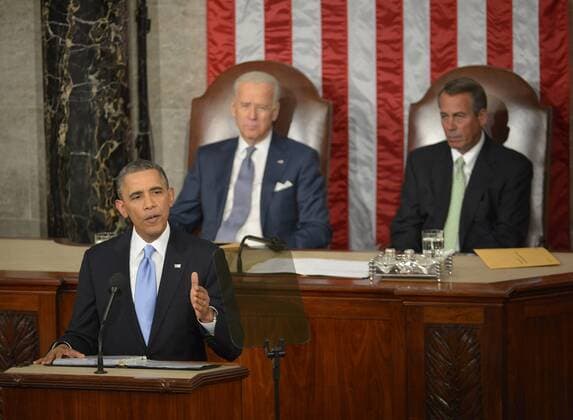 U.S. President Barack Obama makes his State of the Union address to a joint session of congress and the American people in the House Chamber at the U.S. Capitol on January 24, 2014 in Washington, DC. Vice President Joe Biden and Speaker John Boehner sit behind.  WAP20140128205