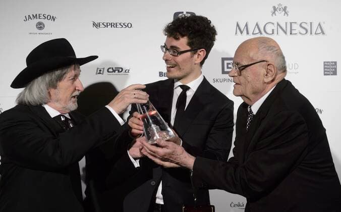 Stepan Hulik (middle), screenwriter of the Burning Bush (Horici Ker) movie poses with annual award Czech Lion for the best screenplay with directors Juraj Jakubisko (left) and Vaclav Vorlicek in Prague, Czech Republic on February 22, 2014. Burning Bush is a 2013 three-part mini-series created for HBO by Polish director Agnieszka Holland. (CTKxPhoto MichalxKamaryt) CTKPhotoP201402220904901  kmt