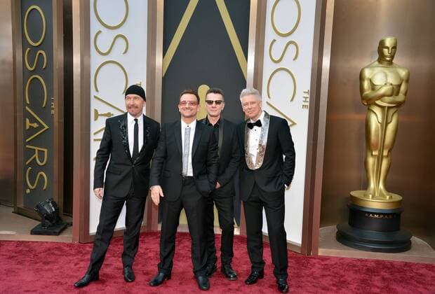U2 - The Edge, Bono, Larry Mullen Jr., Adam Clayton arrive on the red carpet at the 86th Academy Awards at Hollywood & Highland Center in the Hollywood section of Los Angeles on March 2, 2014.  LAP201403023536