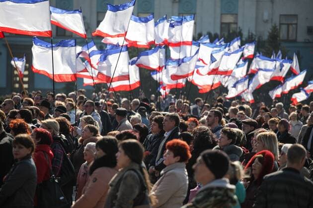 Crimea one day before the referendum. People enjoy the performing with many Crimean flags in the background in a pro Russian rally at Simferopol s Lenin Square. Simferopol, . Saturday, 15th March 2014. Picture by Daniel Leal-Olivas i-Images DanielxLeal-Olivas  IIM-1782-0015