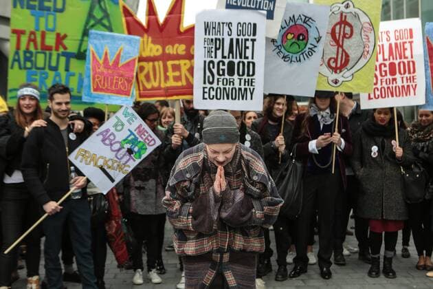 Vivienne Westwood marches agains CEO of IGas. Protesters holdings banners and marching against Fracking in the UK with the fashion designer Vivienne Westwood. Knightsbridge and Chelsea, London, United Kingdom. Wednesday, 19th March 2014. Picture by Daniel Leal-Olivas i-Images DanielxLeal-Olivas  IIM-1818-0013