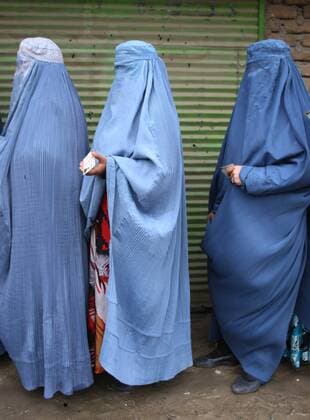 Afghan women line up to cast their ballots at a polling center in Kabul, Afghanistan, on April 5, 2014. The polling for Afghanistan s presidential election concluded on Saturday and counting of ballots has begun, the country s election officials said. A total of 6,218 polling centers remained open on the election day and around 7 million eligible voters, 36 percent of them women, had cast their votes. (Xinhua Ahmad Massoud) AFGHANISTAN-PRESIDENTIAL ELECTION-BALLOTING-CONCLUSION 