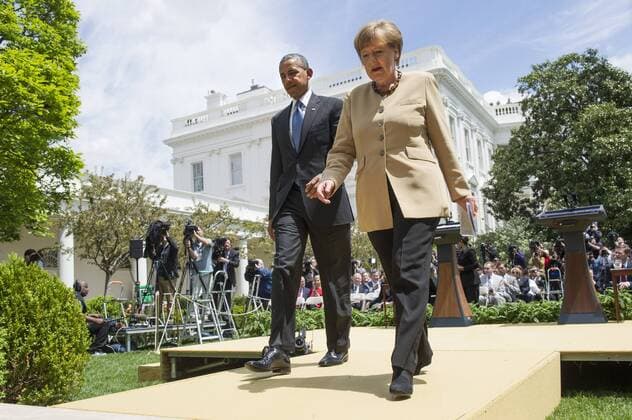 President Barack Obama and German Chancellor Angela Merkel hold a joint press conference in the Oval Office at the White House in Washington, D.C. on May 2, 2014.  WAP20140502349