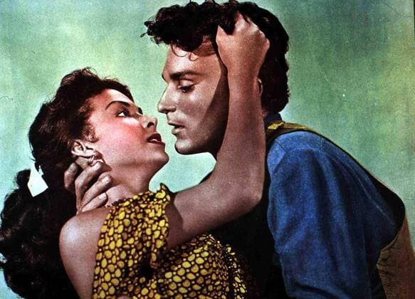 Rita Moreno, Keith Larsen Bridget (Rita Moreno) ahnt nicht, daß Carey (Keith Larsen) ein skrupelloser Mörder und Dieb ist. 1953 UnitedArchives01274142