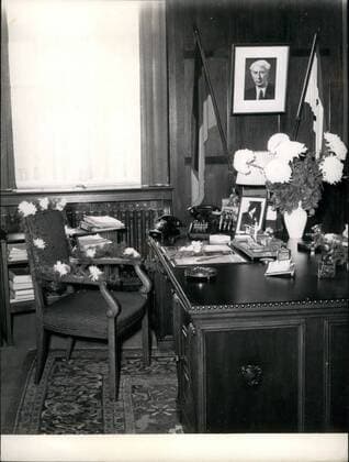 Sep. 09, 1953 - Reuters chair lonely; On this chair, which is now ornated with flowers , the suddenly died mayor of Western Berlin, Prof. Ernst Reuter, worked for freedom and democracy in his town five years long.  - ZUMAk09