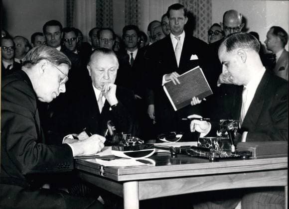 Apr. 04, 1955 - My last function as a High Commissioner is the deposition of these documents, Dr. Conant was saying delivering documents of ratification for Deutschland un Truppenvertrag deigned by President Eisenhower. OPS: signing of the protocol, lef to right, Dr. Conant, Chancelloer Dr. Adenauer and Dr. Hans Berger, chef of the legal department of the foreign office. Keystone picture , April 21, 1955.  - ZUMAk09