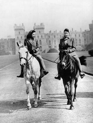 Apr. 16, 1946 - Windsor, Berkshire, U.K. - The elder daughter of King George VI and Queen Elizabeth, ELIZABETH WINDSOR (named Elizabeth II) became Queen at the age of 25, and has reigned through more than five decades of enormous social change and development. PICTURED: PRINCESS MARGARET and PRINCESS ELIZABETH during a horse ride in the Windsor Castle Park. Windsor United Kingdom  - ZUMAk09