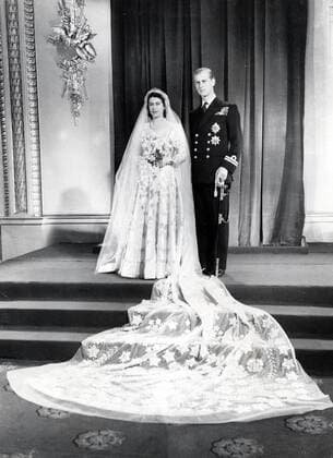 Nov. 20, 1947 - London, England, U.K. - The elder daughter of King George VI and Queen Elizabeth, ELIZABETH WINDSOR (named Elizabeth II) PRINCE PHILIP, Duke of Edinburgh (born Prince Philip of Greece and Denmark) married on 20 November 1947. The wedding was seen as the first glimmer of hope in a post-war Commonwealth, and, though the royal couple received over 2,500 wedding gifts from around the world, rationing required that the Princess save up her ration coupons to buy the material for her wedding dress. PICTURED: Elizabeth II and Prince Philip on their wedding day. London United Kingdom  - ZUMAk09