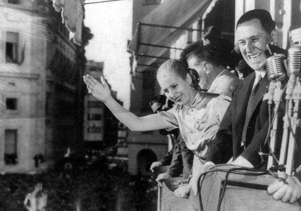 Oct. 23, 1950 - Buenos Aires, Argentina - An army colonel who became president of Argentina three times and was founder and leader of the Peronist movement JUAN DOMINGO PERON together with his second wife, Eva, were immensely popular amongst many of the Argentine people and are still considered icons by the Peronist Party. PICTURED: EVA (EVITA) PERON and Juan wave to citizens from a balcony. Buenos Aires Argentina  - ZUMAk09