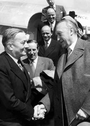 Mar. 12, 1953 - Paris, France - Dr. KONRAD ADENAUER (1876-1967) was a German statesman who served as Foreign Minister and Chancellor of Germany. PICTURED: Adenauer arriving at Orly airport in Paris, from Bonn and being welcomed by Mr. GEORGES BIDAULT, French Foreign Minister. He is in Paris to discuss Franco-German affairs. Paris France  - ZUMAk09
