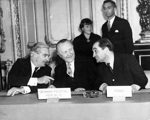 Oct. 3, 1954 - London, England, U.K. - British Prime Minister Mr. ANTHONY EDEN, West German Chancellor Dr. KONRAD ADENAUER and Mr. MENDES FRANCE, the French Premier, signing at Lancaster House in London. London United Kingdom  - ZUMAk09