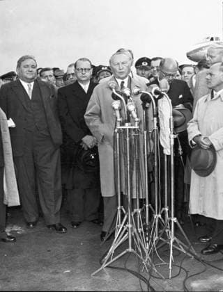 Sep. 15, 1955 - Bonn, Germany - West Germany s first chancellor KONRAD ADENAUER began his career in politics as a member of the Cologne City Council, becoming lord mayor of the city. After the Nazis came to power in 1933, Adenauer, who had not hidden distaste for them, lost his positions, was forced to go into exile for a year in an abbey and was later interned in a prison camp. Adenauer was elected Chancellor of the Federal Republic of Germany on 15 September 1949. His main aim was to ensure West Germany s transition to a sovereign, democratic state. He held power for the next fourteen years and during that time played an important role in restoring good relations with France and the United States. PICTURED: KONRAD ADENAUER giving a speech at Cologne airport after his come back from Moscow. Bonn Germany  - ZUMAk09