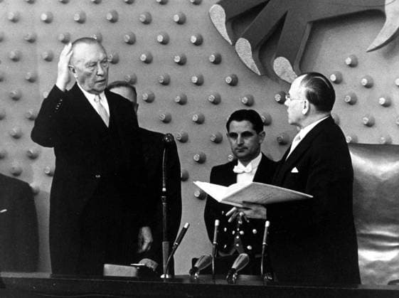 Bonn, Germany - West Germany s first chancellor KONRAD ADENAUER began his career in politics as a member of the Cologne City Council, becoming lord mayor of the city. Adenauer was elected Chancellor of the Federal Republic of Germany on 15 September 1949. PICTURED: KONRAD ADENAUER during his inauguration with President of the German Bundestag EUGEN GERSTENMAIER. Bonn Germany  - ZUMAk09
