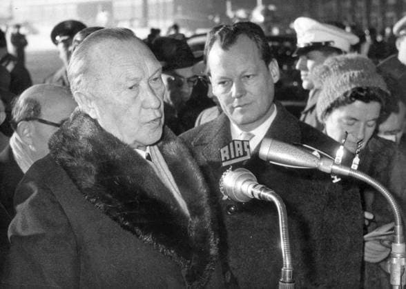 Jan. 12, 1960 - Berlin, Germany - On Jan. 11th, Federal Chancellor Dr. KONRAD ADENAUER arrived in Berlin for a 2 days visit. He will speak before the senate also about the anti-Jewish out-breaks during the last time. PICTURED: Chancellor Dr. Adenauer (L) with the Ruling Mayor of Berlin, WILLY BRANDT (R) at the arrival of the Chancellor at the Berlin airport. Berlin Germany  - ZUMAk09