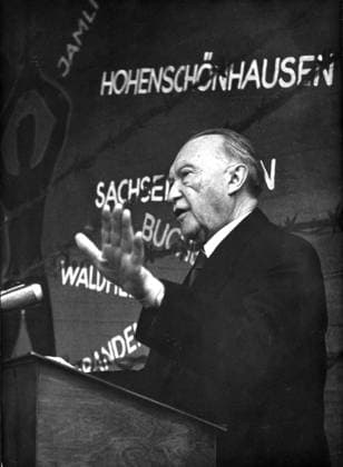 Feb. 15, 1960 - Konigswinter, Germany - The Association of Victims of Stalinism celebrated its 10th anniversary on Feb. 13th in Koenigswinter. Most prominent guest at the celebration was Chancellor Dr. KONRAD ADENAUER. The association is an organization of former political prisoners of the Soviet system. PICTURED: Dr. Adenauer during his speech at the celebration. In the background a map crossed with barbed wire, indicating the places of sorrow for the victims of Stalinism. Konigswinter Germany  - ZUMAk09