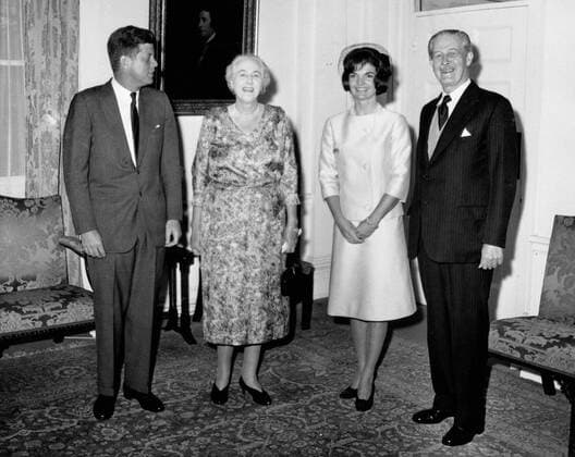 June 5, 1961 - London, England, U.K. - President JOHN F. KENNEDY of the United States (L) and Mrs. JACQUELINE KENNEDY stand posing with their hosts, Prime Minister HAROLD MACMILLAN and Lady DOROTHY MACMILLAN at Admiralty House in London. The American President was paying a short informal visit to London following his talks in Vienna with Mr. Kruschev. London UK  - ZUMAk09