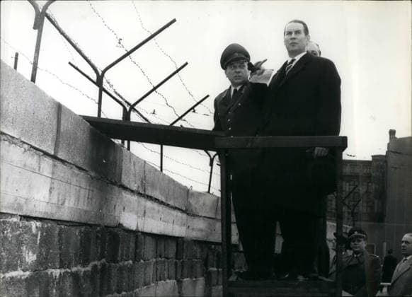 Nov. 11, 1961 - The minister for Foreign Affairs in the Federal Republic of Germany dr. Gerhard Schroder in West-Berlin. For an one day visit the new minister for Foreign Affairs in the Federal Republic of Germany dr. Gerhard Schroder came to West-Berlin today. He wanted to inform, over the wall which is dividing Berlin also. OPS: Left commanding officer of the West-Berlin police Erich Duensing and right minister for Foreign Affairs dr. Gerhard Schroder before the wall on Potsdamer Platz in West-Berlin.  - ZUMAk09