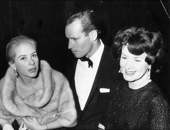 Dec. 9, 1961 - Paris, France - Actor CHARLTON HESTON known for his religious roles in Ben-Hur and The Ten Commandments , pictured with his wife LYDIA CLARKE and GENEVIEVE PAGE at the premiere of El Cid . Paris France  - ZUMAk09