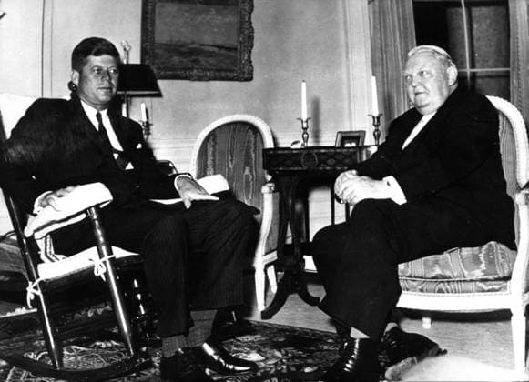 Jan. 1, 1962 - Washington D.C., U.S. - JOHN F. KENNEDY was the youngest person elected U.S. President and the first Roman Catholic to serve in that office. The promise of this energetic and telegenic leader was not to be fulfilled, as he was assassinated near the end of his third year in office. His shocking death stood at the forefront of a period of political and social instability. PICTURED: JOHN F. KENNEDY and Chancellor of West Germany LUDWIG ERHARD in the White House. Washington D.C. USA  - ZUMAk09