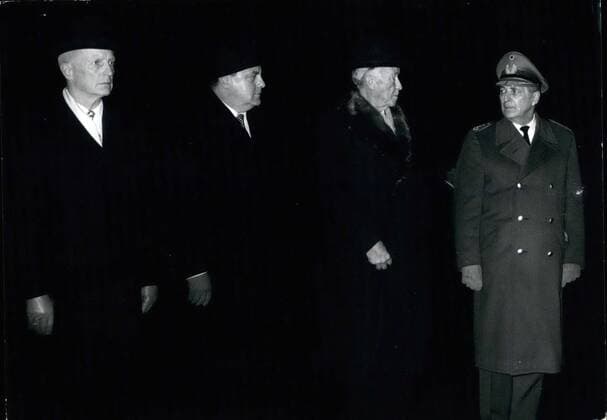 Dec. 12, 1962 - The minister of defense Franz Josef Strauss dismissed: Many persons were present today 19.12.1962 on the aerodrome in Koln Wahn, when the minister of defense Franz Josef Strauss said to the soldiers of the Bundswehr, chancellor Dr. Adenau and his friends. Our foto shows from left: the secretary in the ministry of defense Hope, Franz Josef Strauss, chancellor Dr. Adenauer and the General Foertsch.  - ZUMAk09