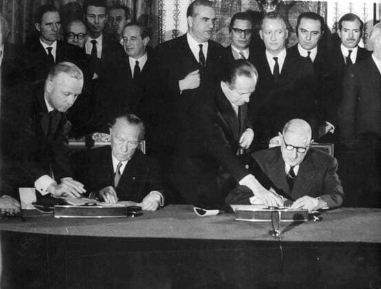 Jan. 22, 1963 - Paris, France - French President General CHARLES DE GAULLE and the German Chancellor KONRAD ADENAUER signed together the French-German Cooperation Treaty at the Murat room of the Palace D Elysee. In the picture were also Mr. BLANKENHORN, Mr. FOUCHET, Mr. MESSMER, Mr. DELONCLE and HERZOG. Paris France  - ZUMAk09