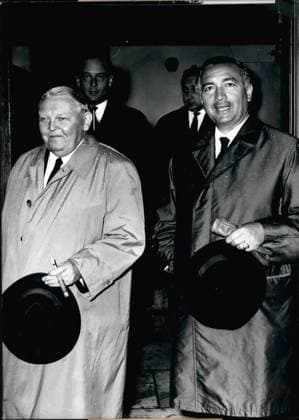 Aug. 08, 1963 - ende visited Erhad : The FDP -President Dr. Erich Mende and the vicarious party - leader Kuhlmann - Stumm, met today (28.8) the proposed federal-Chancellor Erhardin his house on Tegernsee, to discus the problems which are in connection with the change of government in autumn. photo shows The two statesmen leaving the house on Tegernsea. Dr. Erich Mende (On the right) and Prof. Dr. Ludwig erhardt (on the left)  - ZUMAk09