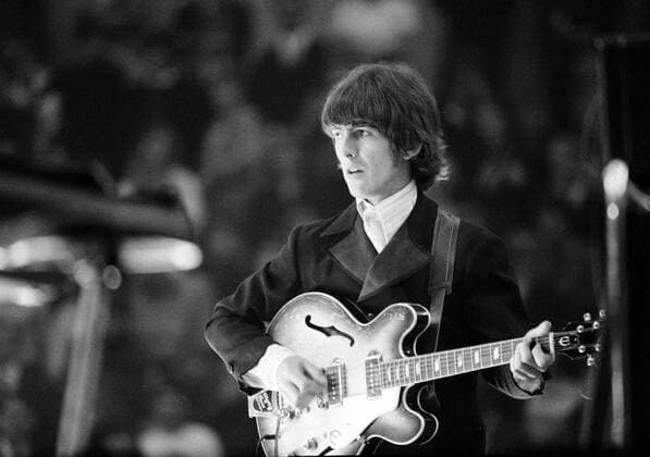 June 25, 1966 - Essen, Germany - Guitarist GEORGE HARRISON during THE BEATLES concert in Essen, Germany. One of the most commercially successful and critically acclaimed bands in the history of popular music, the Beatles led the mid-1960s musical British Invasion into the United States. Essen Germany  - ZUMAk09