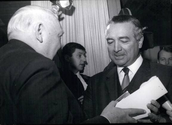 Apr. 04, 1967 - Ex-Chancellor Erhard 70 Years Old- On February 4th the Former Chancellor of the Federal Republic Germany, Prof. Dr. Ludwig Erhard (Prof. Dr. Ludwig Erhard), Celebrated his 70. Birthday, Retired in his villa on Tegernset Bavaria. Erhard Rejected it to be at the Focal point of Apeculative celebrations but he welcome a number of Congratulator. The Most prominent well-wisher of Chancellor Eiesinger OPS: Fltr. Prof. Dr. Erhard, Architect and Ploitical Cartoonist Diping, EMLanf, Changellor Kissing  - ZUMAk09