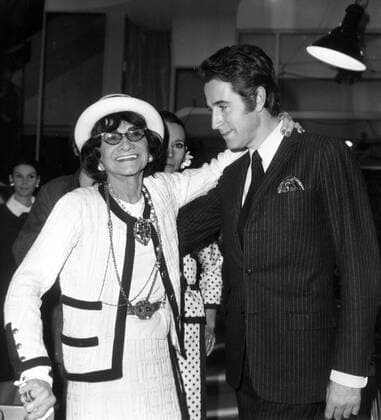 IMAGO ICONS: Coco Chanel Jan. 28, 1968 - Paris, France - (File Photo) COCO CHANEL (born Gabrielle Bonheur Chanel) was a French fashion designer whose menswear-inspired fashions, and pursuit of expensive simplicity made her the most important figure in the history of 20th-century fashion. Her influence was such that she was the only person in the field to be named on TIME Magazine s 100 most influential people of the 20th century. PICTURED: Coco with dancer, JACQUES CHAZOT. Paris France  - ZUMAk09