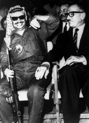 Aug. 12, 1969 - Amman, Jordan - For decades YASSER ARAFAT has been the leader and figurehead of the Palestinian people s struggle for statehood. He was Chairman of the Palestine Liberation Organization, President of the Palestinian National Authority, and leader of the secular Fatah political party, which he founded 1959. Arafat spent much of his life fighting against Israel in the name of Palestinian self-determination. Originally opposed to Israel s existence, he modified his position in 1988 when he accepted UN Security Council Resolution 242. PICTURED: YASSER ARAFAT and Jordanian prime minister ABDELMUNIM AL-RIFAI during a press conference at Amman University. Amman Jordan  - ZUMAk09