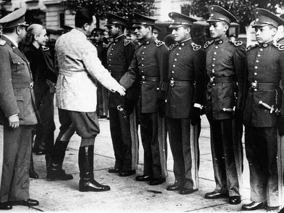 Aug. 19, 1950 - Buenos Aires, Argentina - President JUAN DOMINGO PERON and wife First Lady EVA PERON receive the Paragunyan military cadets upon their arrival for the National Hero Centenary being celebrated. Buenos Aires Argentina  - ZUMAk09
