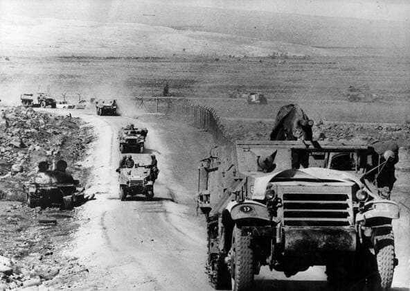 Oct 01, 1973 - Golan Heights, Israel - Also known as the Fourth Arab-Israeli War, Yom Kippur War was fought from October 6 to October 26, 1973 by a coalition of Arab states led by Egypt and Syria against Israel. The war began with a surprise joint attack by Egypt and Syria on the Jewish holiday of Yom Kippur. Egypt and Syria crossed the cease-fire lines in the Sinai and Golan Heights, respectively, which had been captured by Israel in 1967 during the Six-Day War. Many Arab states contributed troops and financial support, and the USSR also provided assistance but ultimately the Arabs buckled under a sustained Israeli counter-attack strengthened by US airlifts. PICTURED: Israeli military column on its way to Syria. Golan Heights Israel  - ZUMAk09