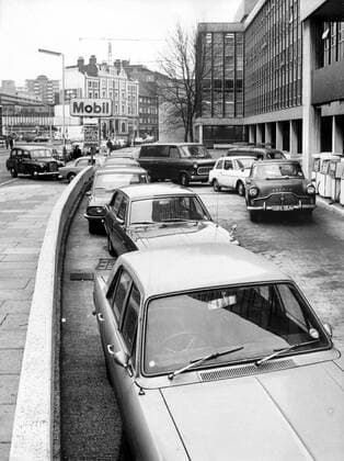 Dec 04, 1973 - London, England, UK - The 1973 oil crisis began on October 17, 1973, when the members of Organization of Arab Petroleum Exporting Countries announced, as a result of the ongoing Yom Kippur War, that they would no longer ship oil to nations that had supported Israel in its conflict with Syria and Egypt (the United States, its allies in Western Europe, and Japan). Because of the dependence of the industrialized world on crude oil and the predominant role of OPEC as a global supplier, these price increases were dramatically inflationary to the economies of the targeted countries, while at the same time suppressive of economic activity. The targeted countries responded with a wide variety of new, and mostly permanent, initiatives to contain their further dependency. PICTURED: Cars standing in a line to a gas station. London UK  - ZUMAk09