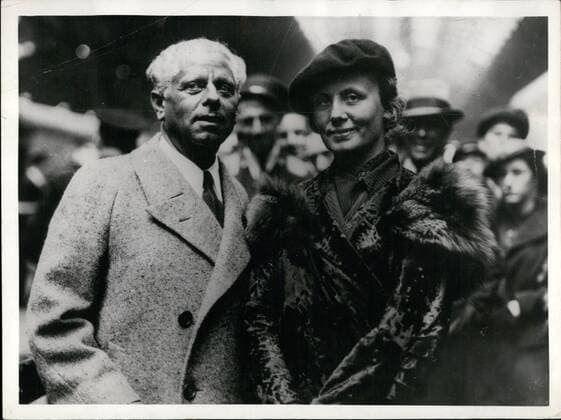 Jul. 07, 1935 - Max Reinhardt And Bride In London: Max Reinhardt, the famous producer arrived at Paddington today on the Ile de France boat train from America with his bride the former Fraulein Helene Kalbeak-Thimig, famous German tragic actress whom he married recently. This is the first stage of their honeymoon. Photo shows Mr. and Mrs. Max Reinhardt, photographed on arrival at Paddington today.  - ZUMAk09
