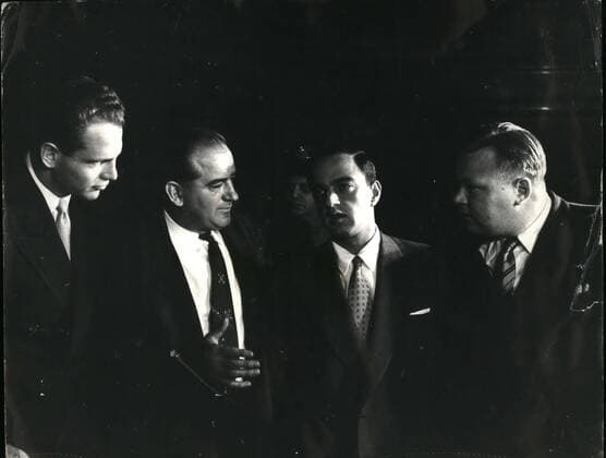 Sep. 09, 1953 - SENATOR McCARTHY GOES AFTER THE COMMUNISTS...INVESTIGATION SUB-COMMITTEE IN SESSION... SENATOR JOSEPH McCARTHY the well known communist hunter - in New York to question men known session at the Federal Court where his investigations sub committee sat. The investigation of ABRAHAM UNGER a lawyer who was of the defence council for 11 top Reds who were convicted of violating the Smith Act, was the main business of the day - but as UNGER refused ordered a Guard to remove him from the session and said that he would file papers siting him for contempt. Unger challenged McCarthy s right to question him on his political beliefs, and did not claim the Fifth Amendment as a justification for his refusal to answer. KEYSTONE PHOTO SHOWS: DAVIS SHINE (Chief Consultant) SENATOR McCARTHY, ROY COHN (Chief Counsel) and FRANK CARR in a huddle during the session.  - ZUMAk09