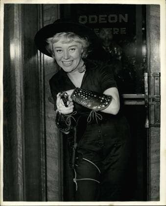 Jan. 24, 1958 - First Night of Cowboy - Film in London. Keystone Photo Shows:- Screen star Glynis Johns makes charming Cowgirl - when she turned up last evening for the premiere of Cowboy at the Edeon Leicester Square.  - ZUMAk09