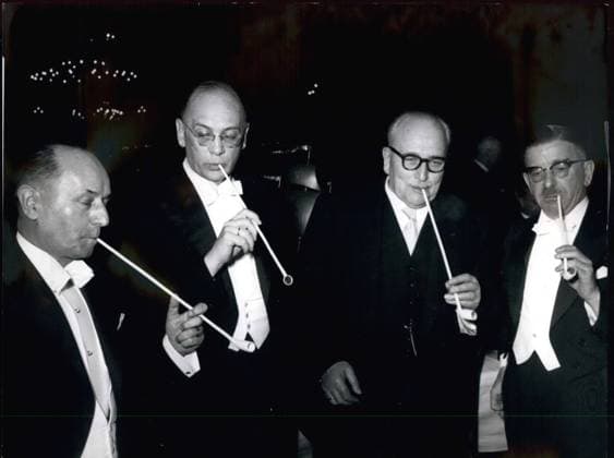 Feb. 02, 1958 - At the traditional Schaffer meal in Bremen... taking place at February 14, 58 in the old town hall, like every they were smoking out of long, pottery pipes. Our picture shows: from left to right side the Bavarian Prime Minister Dr. Hanns Seidel, the Federal Minister of Finances Franz Etzel, the senate s president of Bremen Kaisen and the Austrian Foreign Minister Dr. Leopold Figl.  - ZUMAk09