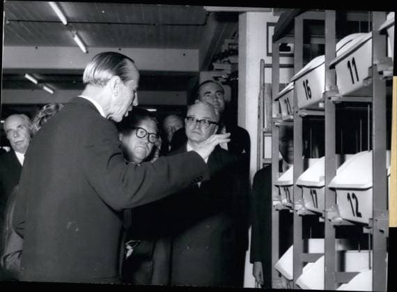Sep. 09, 1960 - Neckermann opens new mail-order house: The Frankfurt businessman and winner of the bronce medal in training riding at the Olympic Games in Rome, Josef Neckermann (JOSEF NECKERMANN), on Sept. 15th opened his new mail-order house in Frankfurt. Federal Treasuror of Germany, Wilhelmi (WILHELMI) has shown to him the installations of the new house whose heart is the greatest electronic calculating machine of Europe. With it, about 150 000 orders can be carried out every day. Photo shows Josef Neckermann (left) explaining to Minister Wilhelmi (right) the system of the conveyor belt.  - ZUMAk09