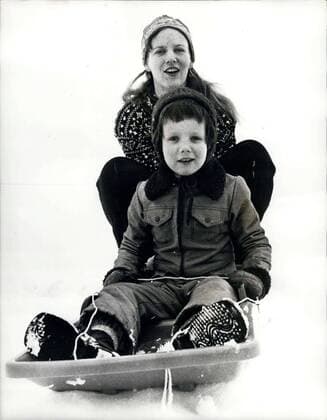 Feb. 21, 1974 - Danish Royal Family Enjoy Winter Holidays.: Queen Margrethe and Prince Henrik of Denmark with their children Prince Frederik and Prince Joachim, are enjoying a winter sports holiday at Megeve, in the French Alps. Photo shows Queen Margrethe gives little Prince Frederik a toboggan ride, at Megeve.  - ZUMAk09
