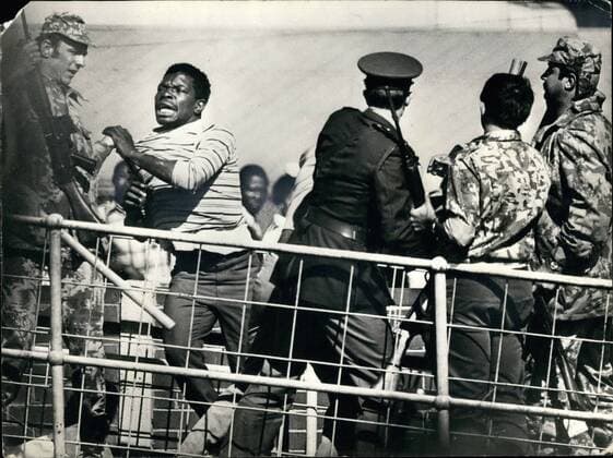Jun. 06, 1976 - 100 People Killed And More Than 1,000 Injured In South Africa s Worst Outbreak Of Civil Unrest: The worst outbreak of civil unrest in South Africa has claimed the lives of 100 people, and more than 1,000 have been injured in rioting in Soweto, the African township outside Johannesburg. The rioting began during a march by black students protesting against the use of Afrikaans in lessons. Police opened fire and the rioters set fire to buildings and cars. Photo shows Police arresting some of the rioters during the clashed in Soweto.  - ZUMAk09