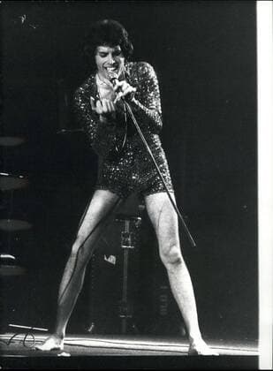 IMAGO ICONS: Freddie Mercury May 12, 1978 - Queen on stage at Wembley.: One of the world s top band, Queen, last night played the first of three sell out concerts at London s Wembley Arena. These dates plus two in Stanford last weekend, are the groups first live appearances in the U.K. since they toured here a year ago, culminating in the Jubilee Day Concert, and are the only appearance planned for this year. Photo shows lead singer of Queen, Freddie Mercury seen on stage at Wembley last night.  - ZUMAk09