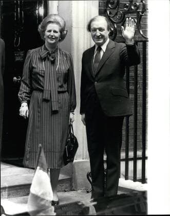 May 05, 1980 - Irish P.M. at Downing Street: The first extended meeting between Charles Haughey, Prime Minister of the Irish Republic and Mrs Thatcher took place in Downing street this morning. The two leaders made contact at the EEC summit earlier this month and it was agreed that it was time for a formal meeting to consider the future of Ireland. Photo shows Charles Haughey gives a wave as he is greeted at the door of No 10, by Mrs Thatcher.  - ZUMAk09