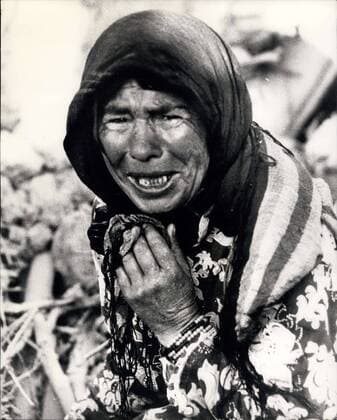 Aug. 25, 1966 - Earthquake scenes from Turkey: Original pictures just received, show scenes from Varto, which took the full force of the earthquake which struck provinces in Eastern Turkey last Friday, and which killed 2,300 people and rendered 70,000 homeless. Photo shows Overcome by grief the bereaved mother bursts into wild sobbing.  - ZUMAk09