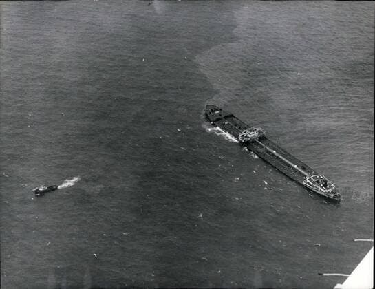 Mar. 03, 1967 - Tugs fail to crippled tanker: New efforts were made last night to free the crippled tanker Torrey Canyon from Seven stones reef off Land s End, but the straining tugs failed to move her. Another attempt will be made today. Photo Shows One of the tugs seen near the stricken Torrey Canyon, during last night s attempt to free the tanker.  - ZUMAk09