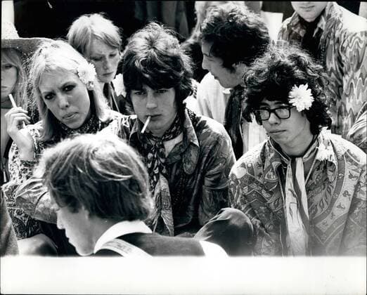 Jul. 07, 1967 - THE FLOWER PEOPLE GATHERS IN HYDE PARK. Hundreds of young hippies gathered in Hyde Park yesterday, where they were having a be-in . They spread the word of love (the flower people are dedicated to making society more spiritually and mentally aware) and they spread the word of marijuana (which they want legalised) With bells on their toes, flowers in their hair, and carrying Flower Power banners, they gathered on the grass reciting poetry, singing and dancing. The crowd must have been about 5,000, mostly hippies, but many of them curious sightseers. PHOTO SHOWS:- At the Hyde Park be-in yesterday, hippies and sightseers get the message. - ZUMAk09