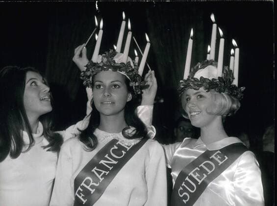 Dec. 09, 1967 - Mr. Caldagues, Paris s Council President, received Janine Sanson, the sacred Queen of the French Light in the city hall, surrounded by her 16 dauphines of France and by the Swedish Saint Lucia, Anne Christine Leonardson. Sheila lit the 5 candles solemnly on the Queen s crown. The Queen will participate in the Saint Lucia festivities in Stockholm with her 16 companions on December 13th.  - ZUMAk09