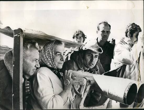 Oct. 10, 1971 - Mrs. Meir at the Front. photo shows The Israel Prime Minister, Mrs. Golda Meir studies the Syrian landscape from an observation post in the occupied Golan Heights during her tour of Israel s Northern border. On left is her chief of staff, Lt. Gen. haim Bar-Lev.  - ZUMAk09