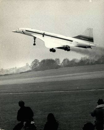 Dec. 17, 1971 - Concorde 01 makes first flight.: Concorde 01, the first pre-production aircraft, is the third Concorder to fly, It has been assembled at the Filton works of British Aircraft Corporation Commercial Aircraft Division, and after taking off today form the Filton airfield, it flew to the Division s Flight Test Centre at Fairford, Gloucestershire where it will be based for its flight test programme. A minor defect in the under-carriage limited the flight of the aircraft today. It had been planned to fly the aircraft down the Bristol Channel as far as St. Mawgan, Cornwall, instead it came in earlier than planned at Fairford. Photo shows Concorde 01 - the first pre-production aircradt and the third Concorde to fly, taking off from Filton today. Externally, the immediate apparent diffence between the 01 and the prototype aircraft is the vizor, the upper retractable section of  - ZUMAk09